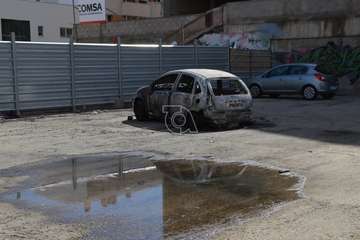 Quema de contenedores en La Herradura y vehículo quemado en el parquin de Arnao/TA.